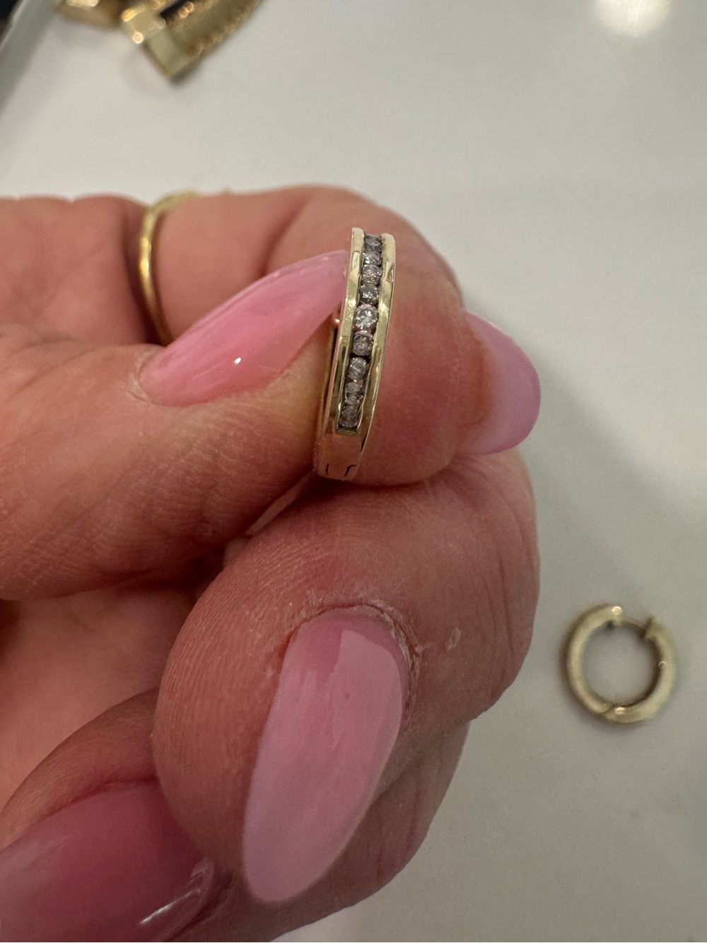 Stamped 10K Diamond Channel Huggie Earring - Yellow Gold.
